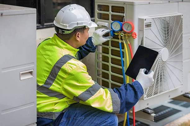 Professional Hvac Maintenance technician working in Arlington Heights, MA